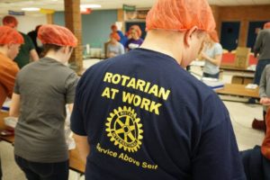 serving food at a rotary service event